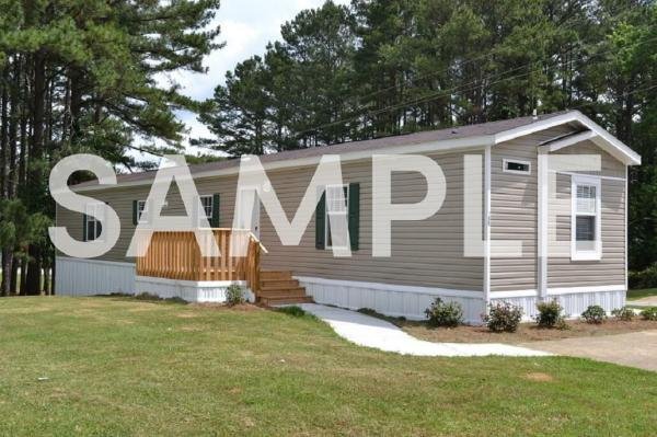 Photo 1 of 1 of home located at 3101 River Rd., Lot #56 Sodus, MI 49126