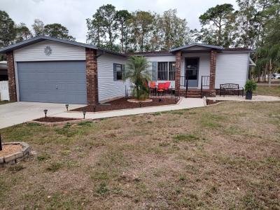 Mobile Home at 19399 Tarpon Woods Ct., #61J North Fort Myers, FL 33903
