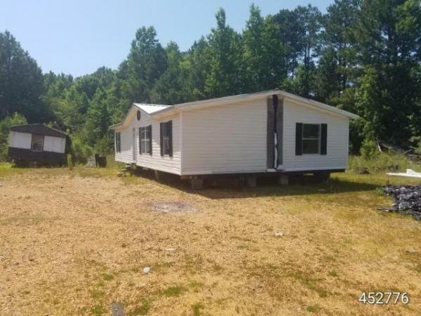 Photo 1 of 2 of home located at COLUMBUS MOBILE HOME BROKER I 7421 HWY 45 NORTH, PO BOX 9647 Columbus, MS 39705