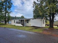 Photo 2 of 19 of home located at 10701 SE Hwy 212, Spc. E8 Clackamas, OR 97015