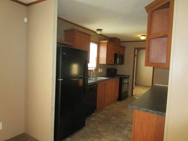 Photo 1 of 2 of home located at 6025 NW Jarboe Street Lot Ja6025 Kansas City, MO 64118