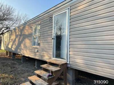 Mobile Home at C A KELLY INC 16055 N HWY 16 LOT 6 Poteet, TX 78065