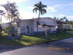 Photo 1 of 21 of home located at 6710 NW 45th Way R06 Coconut Creek, FL 33073