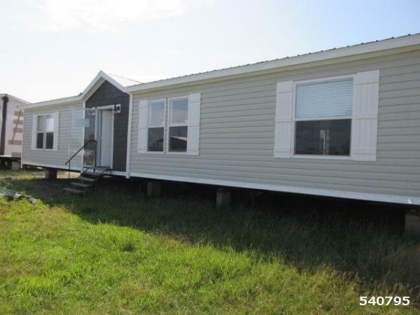 Photo 1 of 2 of home located at Mid Miss Homes & Transport Inc 906 B North Jackson Kosciusko, MS 39090