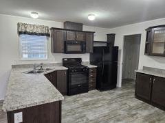 Photo 4 of 29 of home located at 11972 Springbrook Court #60 Romeo, MI 48065