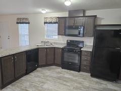 Photo 5 of 29 of home located at 11972 Springbrook Court #60 Romeo, MI 48065