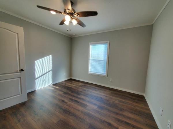 Photo 1 of 2 of home located at 11720 Thousand Trails Rd, The Reserve #165 Willis, TX 77318