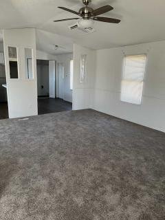 Photo 2 of 5 of home located at 1616 East 78th Ave. Lot #143 Denver, CO 80229