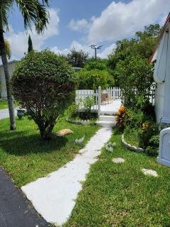 Photo 4 of 38 of home located at 6870 NW 43rd Ave, Lot A17 Coconut Creek, FL 33073