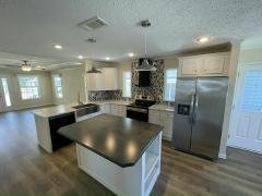 Photo 4 of 21 of home located at 13145 Grape Avenue Grand Island, FL 32735