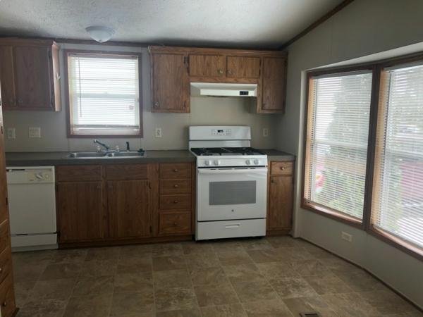 Photo 1 of 2 of home located at 45501 Carousel Drive W., Site #34 Macomb, MI 48044