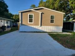 Photo 4 of 11 of home located at 13618 N. Florida Avenue Lot #64 Tampa, FL 33613