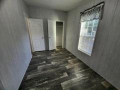Photo 5 of 11 of home located at 13618 N. Florida Avenue Lot #64 Tampa, FL 33613