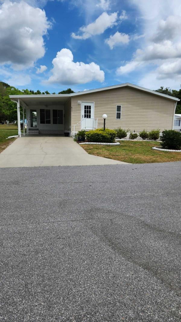 1999 Homes of Merit Mobile Home For Sale 8111 E. Spikemoss Lane