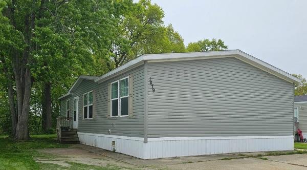Photo 1 of 2 of home located at 1479 Kenora Avenue Lot 566 Muskegon, MI 49444