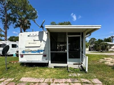 Mobile Home at 10400 Hwy 27, Lot#E-4 Frostproof, FL 33843