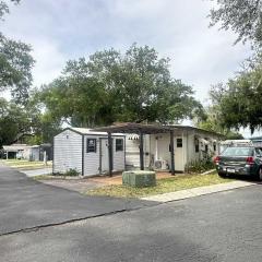 Photo 2 of 23 of home located at 34408 State Road 54 Lot #61 Zephyrhills, FL 33543