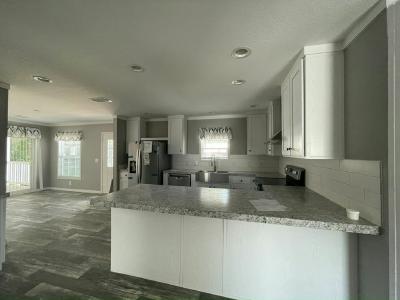 Photo 3 of 21 of home located at 13206 Grape Avenue Grand Island, FL 32735