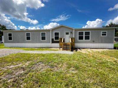 Mobile Home at 427 County Road 3892 W Cleveland, TX 77327