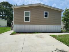 Photo 1 of 9 of home located at 13618 N. Florida Avenue Lot #26 Tampa, FL 33613