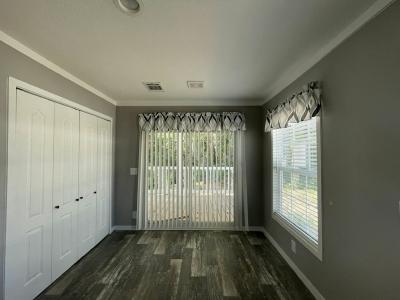 Photo 3 of 21 of home located at 13206 Grape Avenue Grand Island, FL 32735