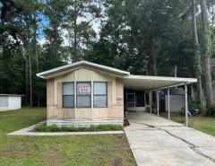 Photo 1 of 54 of home located at 9901 SE Hwy 314 Lot A42 Silver Springs, FL 34488