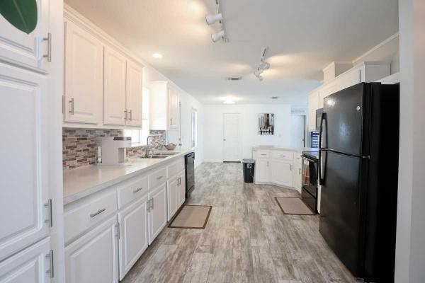 Photo 1 of 2 of home located at 11300 Rexmere Blvd,  #1/4-Pl Fort Lauderdale, FL 33325