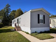 Photo 1 of 7 of home located at 2982 Ridge Drive Lot 53 Alanson, MI 49706