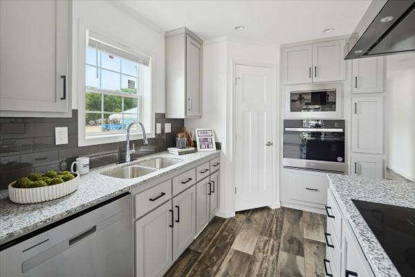 2024 Champion 395A Multi Section Duplex/Northwood Singlewide - Gray/White  Home