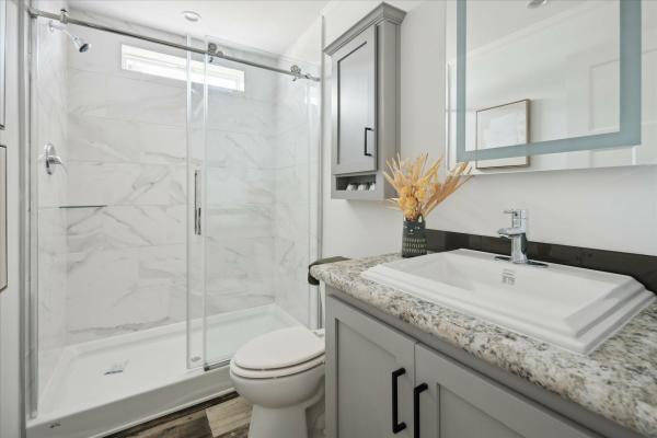 2024 Champion 395A Multi Section Duplex/Northwood Singlewide - Gray/White  Home