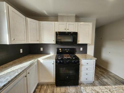 Photo 5 of 31 of home located at 4552 Spruce Court #472 Clarkston, MI 48348