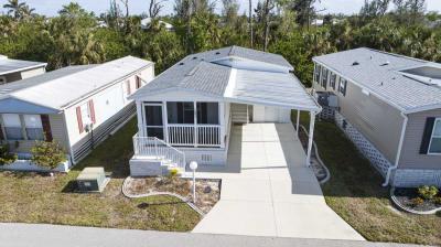 Photo 2 of 37 of home located at 701 Aqui Esta Drive Lot 101 Punta Gorda, FL 33950