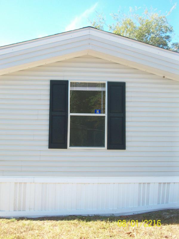 Photo 1 of 2 of home located at 7117 SW Archer Rd Lot #60 Gainesville, FL 32608