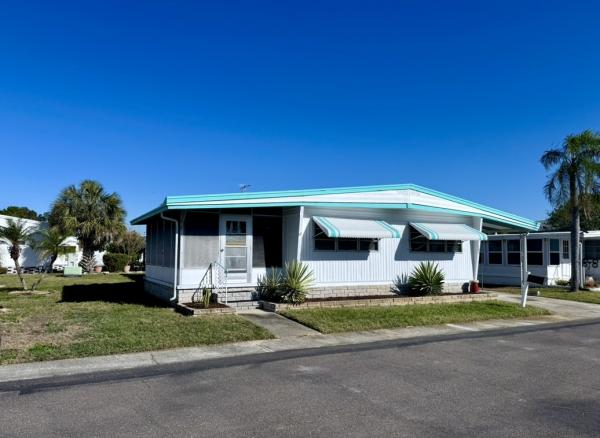 Photo 1 of 2 of home located at 1100 Curlew Rd Lot 182 Dunedin, FL 34698