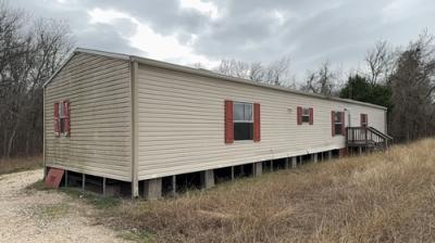 Photo 1 of 21 of home located at 2209 Park Ln Webberville, TX 78621