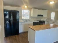 1999 Palm Harbor 56D1PH Manufactured Home