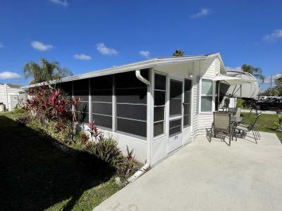 Photo 2 of 27 of home located at 1000 Wiggins Pass Rd, Lot 276 Naples, FL 34110