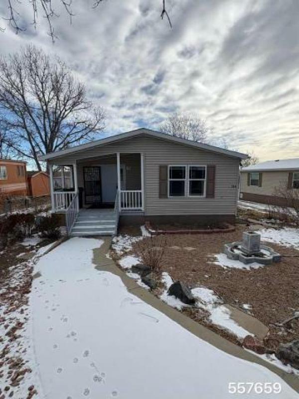 Photo 1 of 2 of home located at Pine Lakes Ranch 4211 E 100th Ave Lot 384 Denver, CO 80229