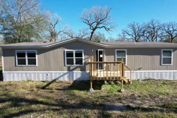 Photo 1 of 2 of home located at 25972 Cemetery Road Bedias, TX 77831