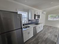 2024 Great Outdoor Cottages 2112BW G2 (8 porch) - GOC Mobile Home