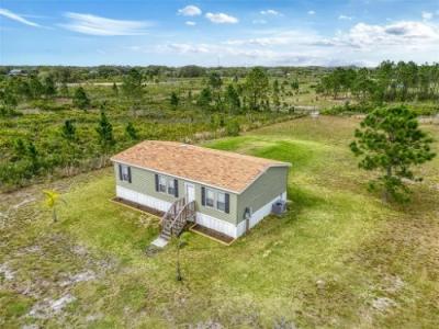 Photo 2 of 19 of home located at 18081 NW 300th St Okeechobee, FL 34972