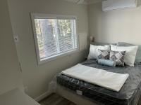 2025 Great Outdoor Cottages 2112BW G2 (8 porch) - GOC Mobile Home