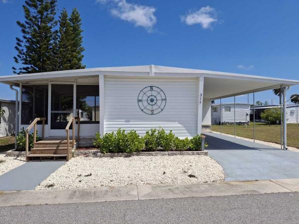 Photo 1 of 2 of home located at 7349 Ulmerton Rd Lot 314 Largo, FL 33771