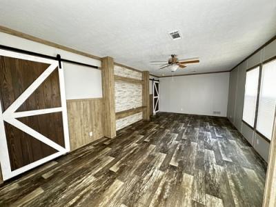 Photo 2 of 17 of home located at 63 County Road 3470 N Cleveland, TX 77327