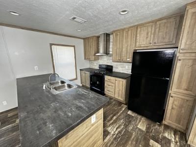Photo 5 of 17 of home located at 63 County Road 3470 N Cleveland, TX 77327