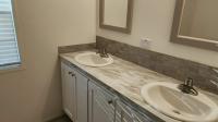 2022 Champion Signature Series - 1/2 porch Manufactured Home