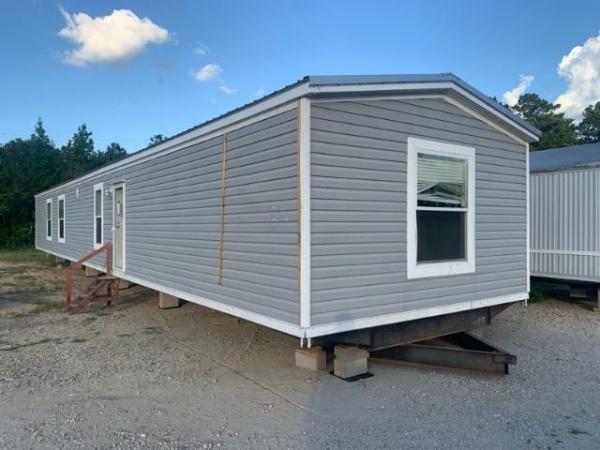 Photo 1 of 2 of home located at Milford Enterprise Inc. 8652 Us Highway 96 N Brookeland, TX 75931