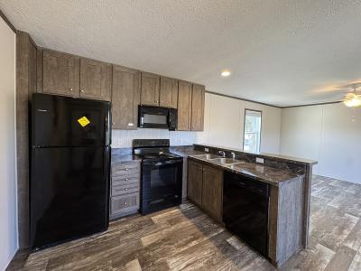 Photo 4 of 32 of home located at 17 Bluebird Hill  #407 Orion Township, MI 48359