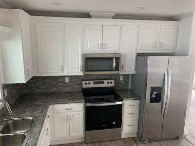 Photo 4 of 11 of home located at 11634 Imperial Oaks Blvd. New Port Richey, FL 34654