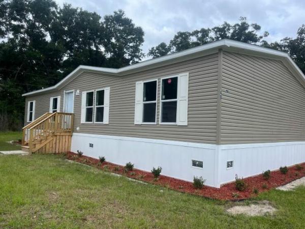 Photo 1 of 2 of home located at 6038 Savannah Hwy Lot 64 Ravenel, SC 29470